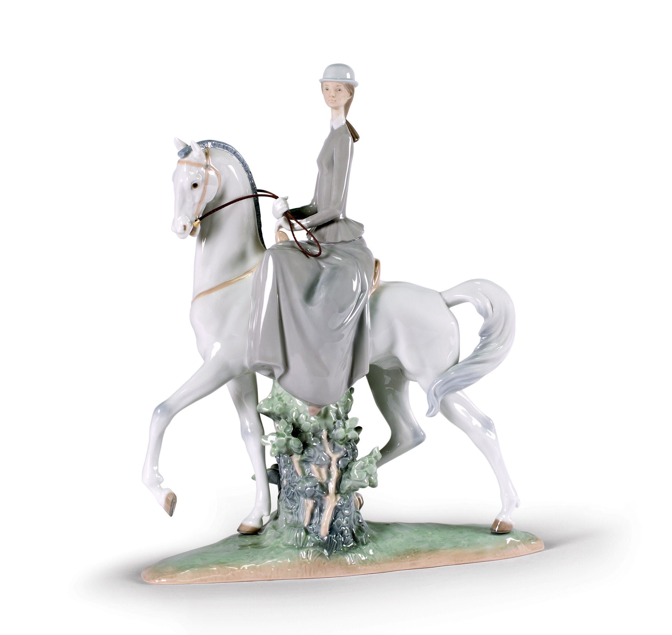 Figurina di donna a cavallo