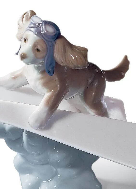 リヤドロ　紙船と犬 Puppy's Paper Boat and Plane Set | Lladró® USA