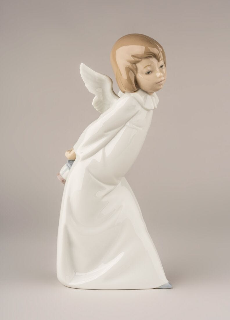 Curious Angel Figurine in Lladró