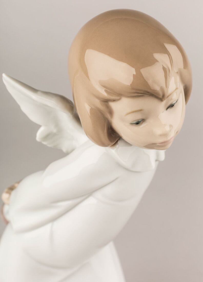 Curious Angel Figurine in Lladró