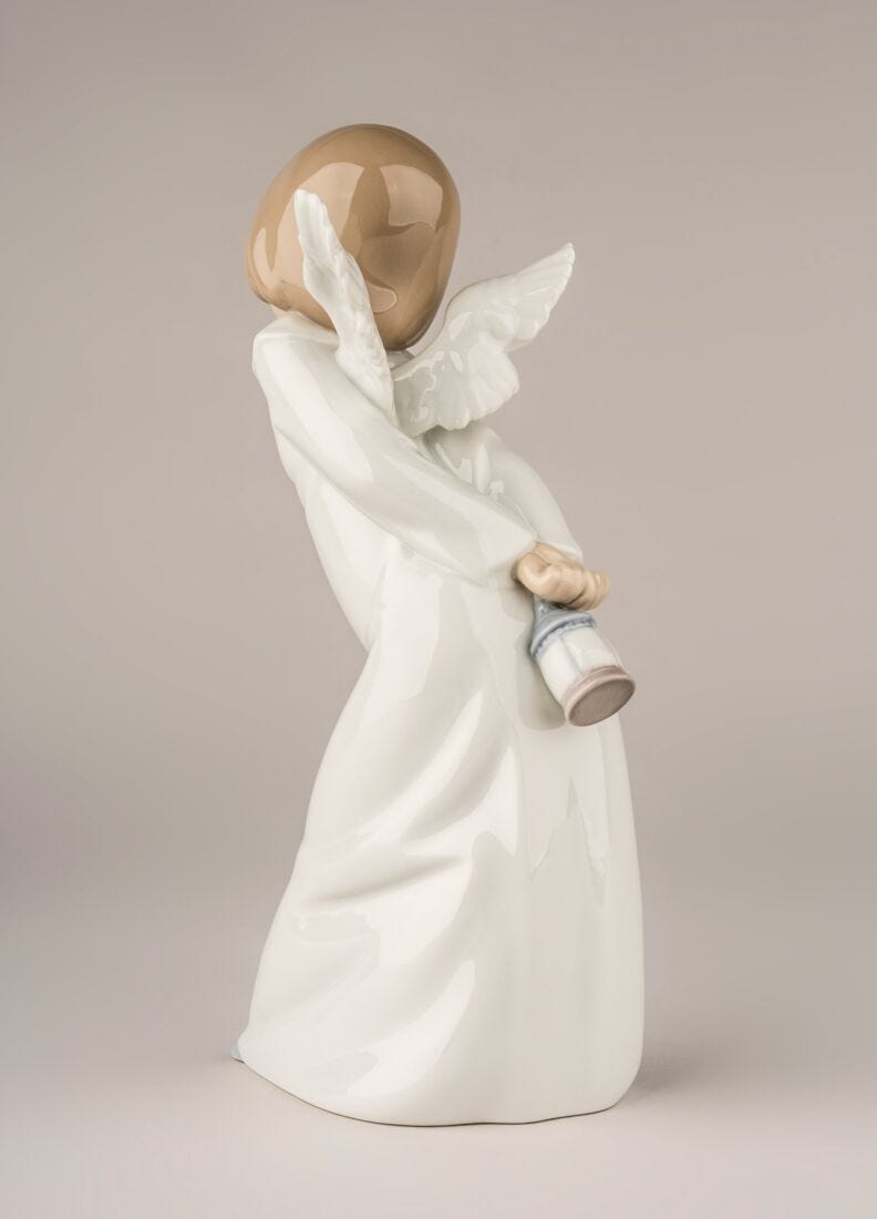 Curious Angel Figurine in Lladró