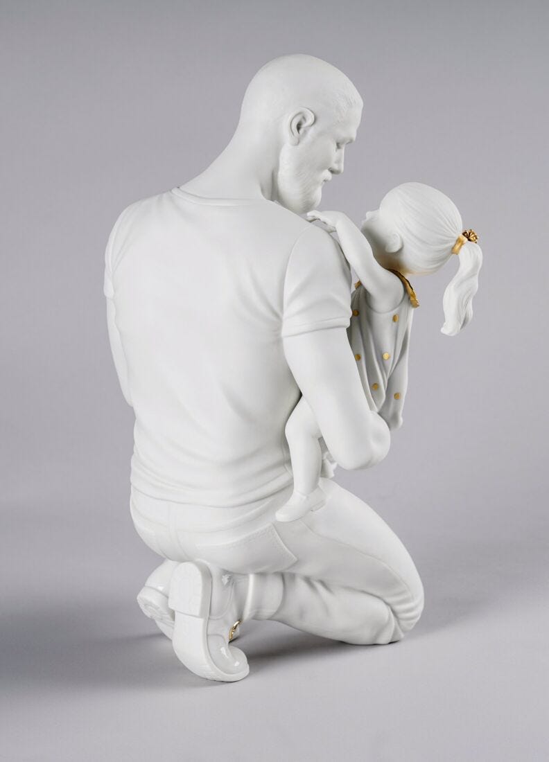 In Daddy's Arms Figurine. Golden & White Luster in Lladró