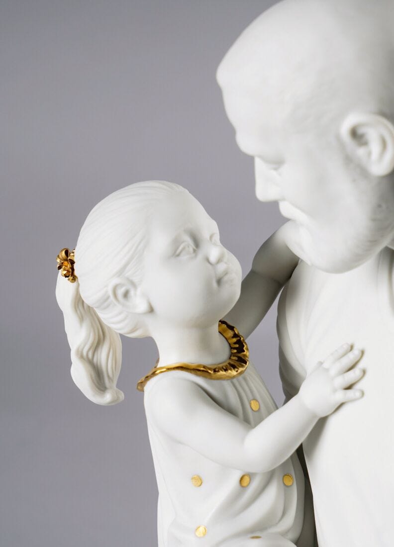 Figurina Tra le braccia di papà. Lustre oro & bianco in Lladró
