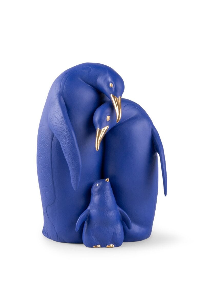 Escultura Familia de pingüinos. Serie Limitada. Azul y dorado en Lladró