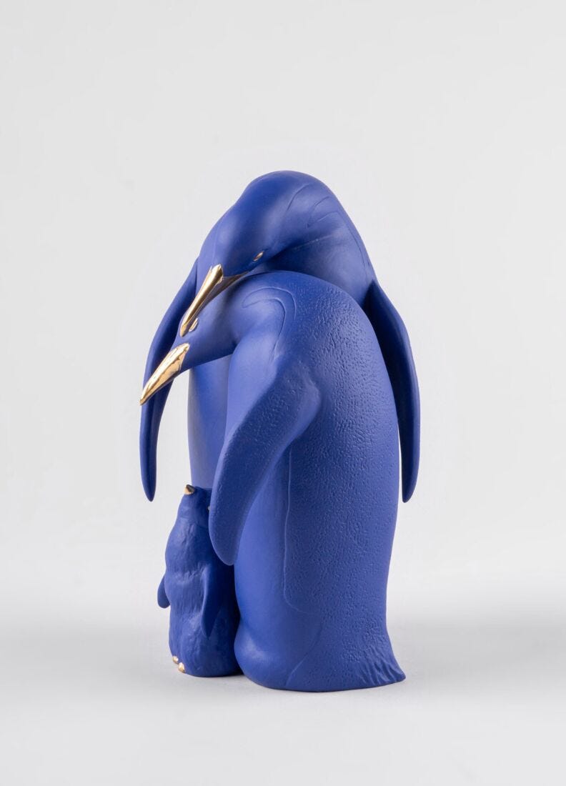 Escultura Familia de pingüinos. Serie Limitada. Azul y dorado en Lladró