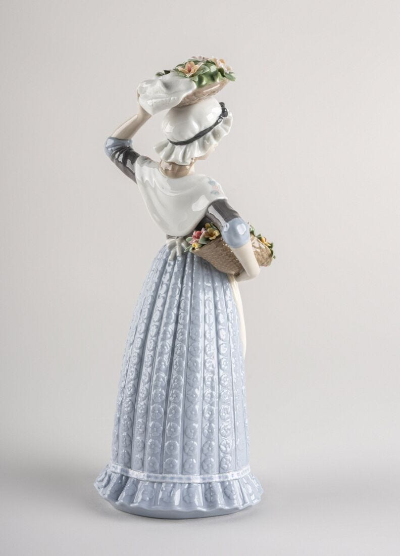 Flower Picking Woman Figurine in Lladró