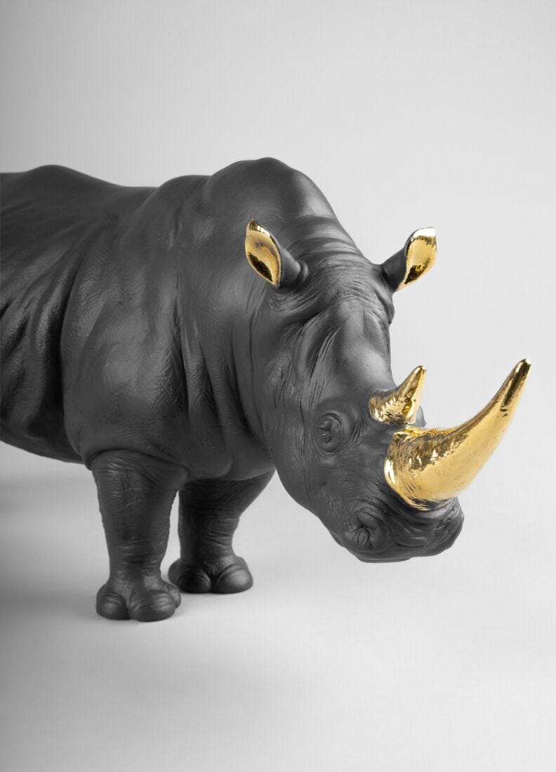 Rhino (black-gold) Sculpture. Limited Edition in Lladró