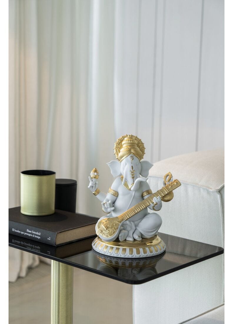 Veena Ganesha Figurine. Golden Lustre in Lladró