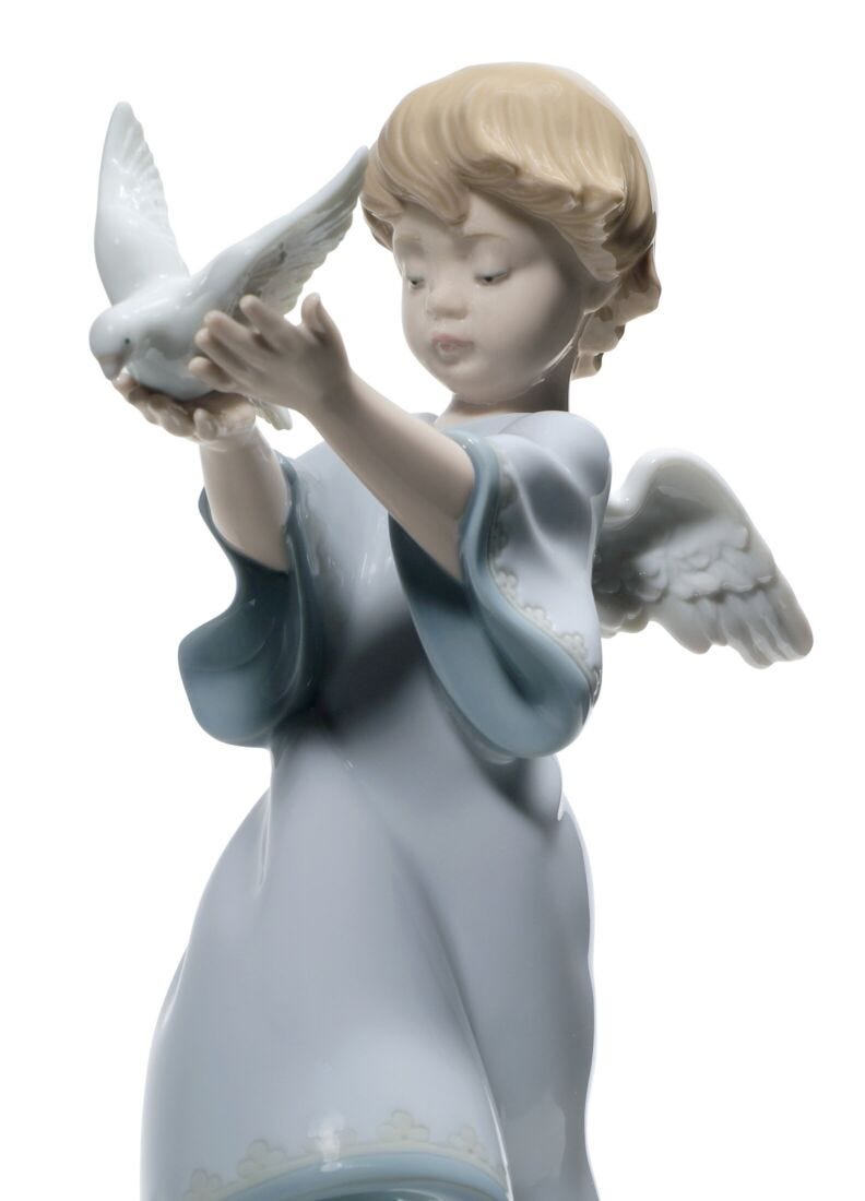 Figura ángel Paz en la tierra en Lladró