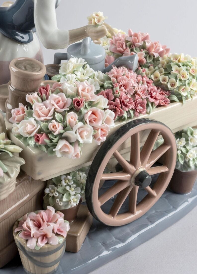 Escultura mujer El puesto de flores en Lladró