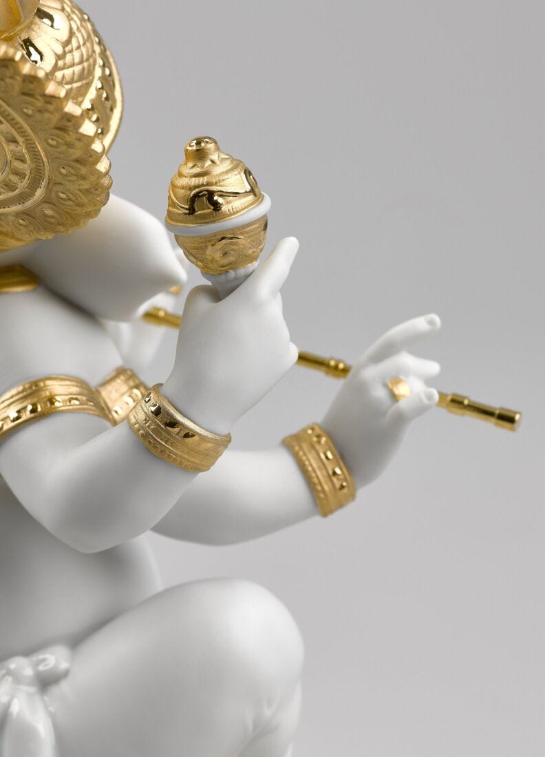 Figurina Ganesha con bansuri. Lustro oro in Lladró
