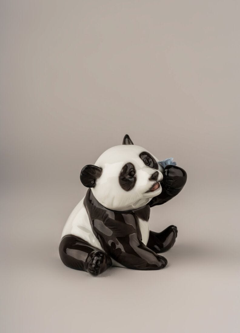 A Happy Panda Figurine in Lladró