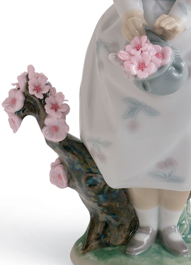 A Walk through Blossoms Girl Figurine in Lladró