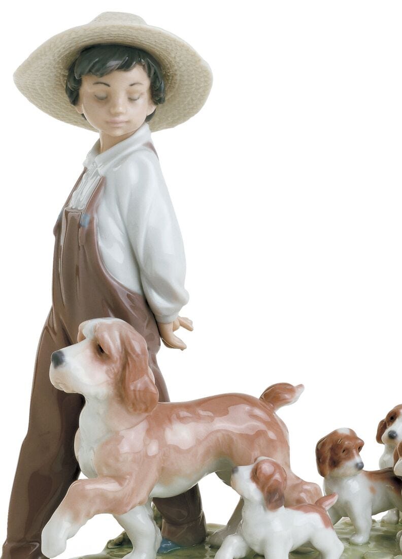 My Little Explorers Boy with Dogs Figurine in Lladró