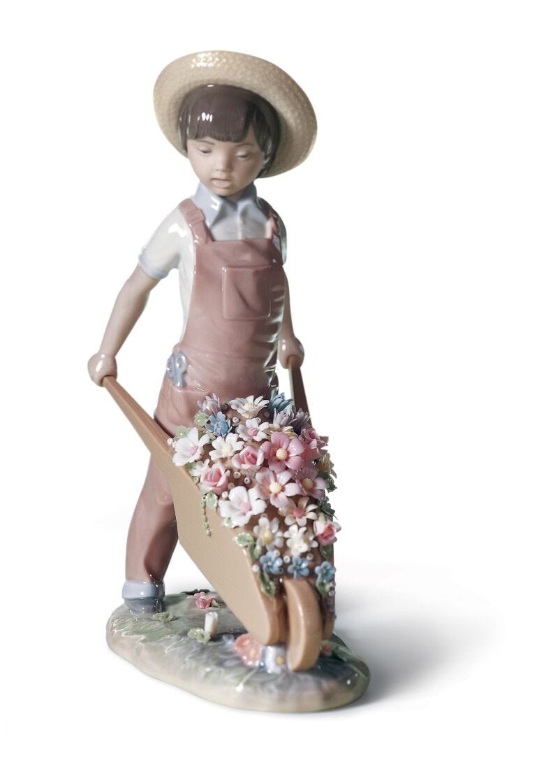 Wheelbarrow with Flowers Boy Figurine in Lladró
