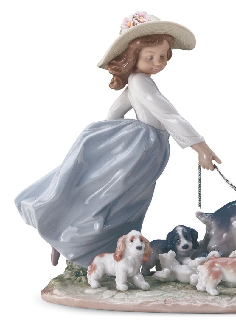 Puppy Parade Girl with Dogs Figurine in Lladró