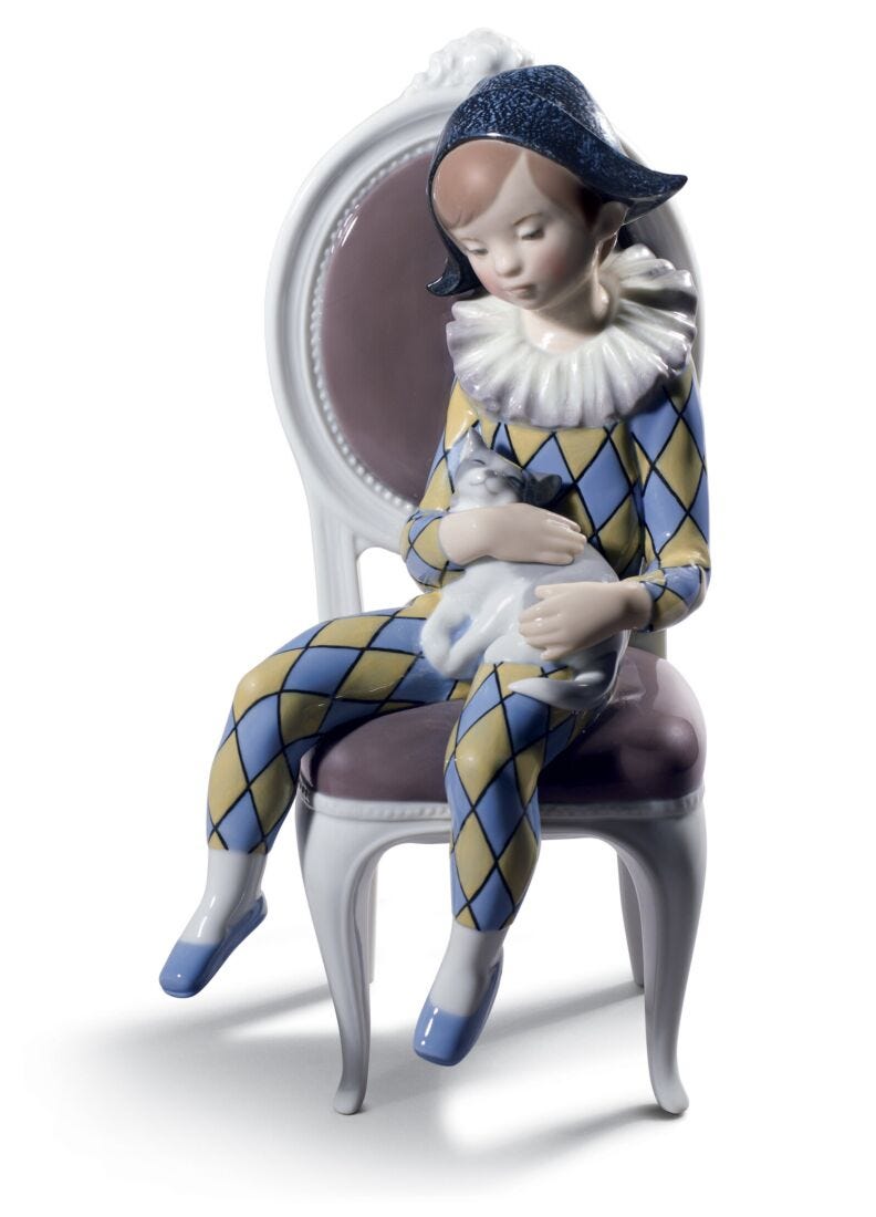 Figura Niño arlequín sentado. Azul y amarillo en Lladró
