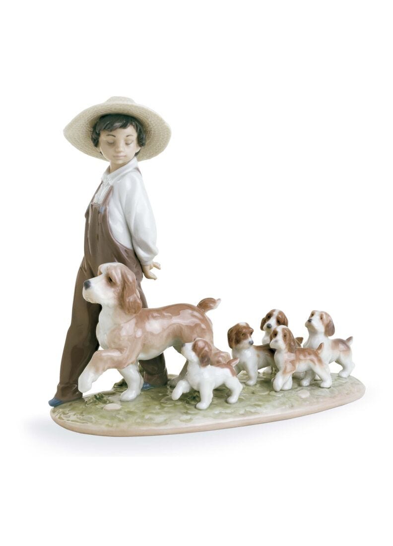 My Little Explorers Boy with Dogs Figurine in Lladró