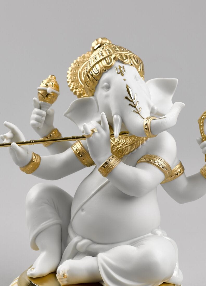 Bansuri Ganesha Figurine. Golden Lustre in Lladró