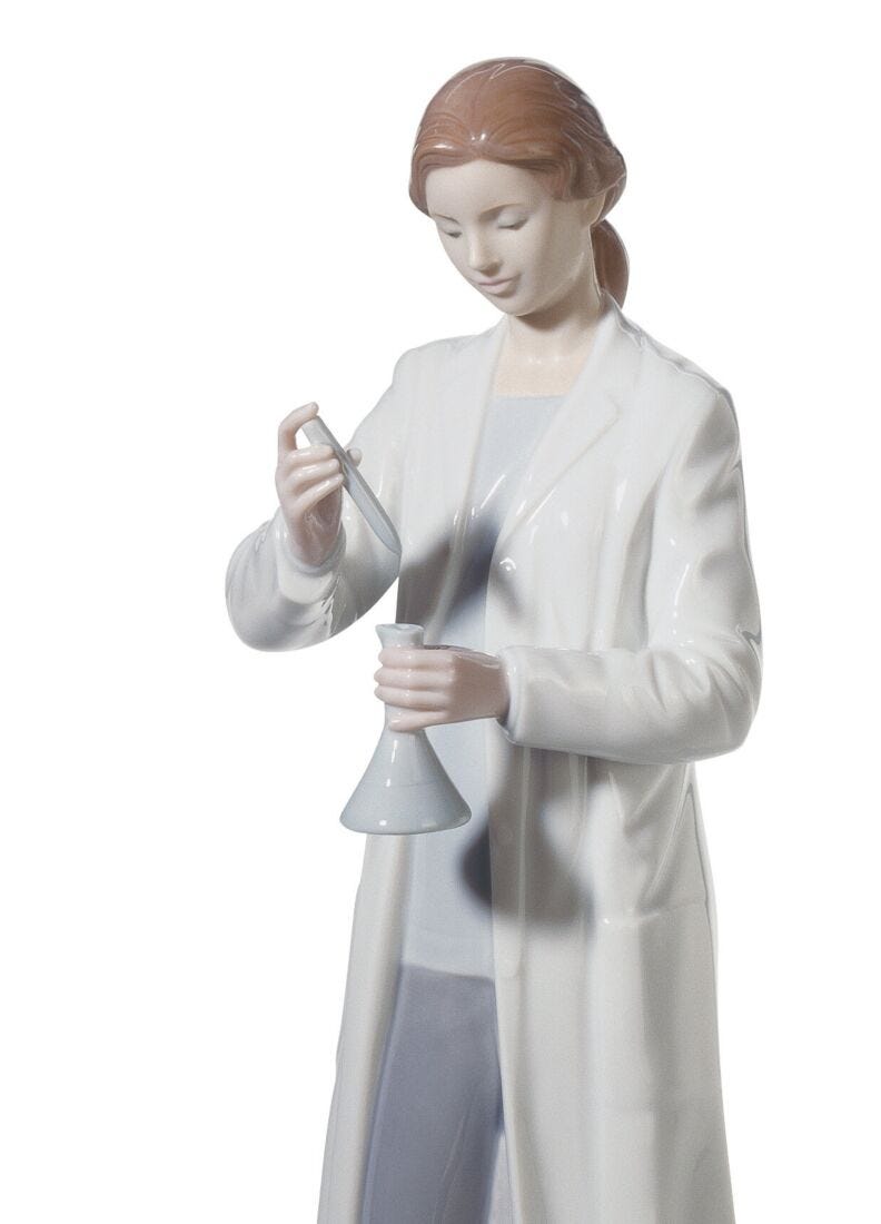 In The Laboratory Woman Figurine in Lladró