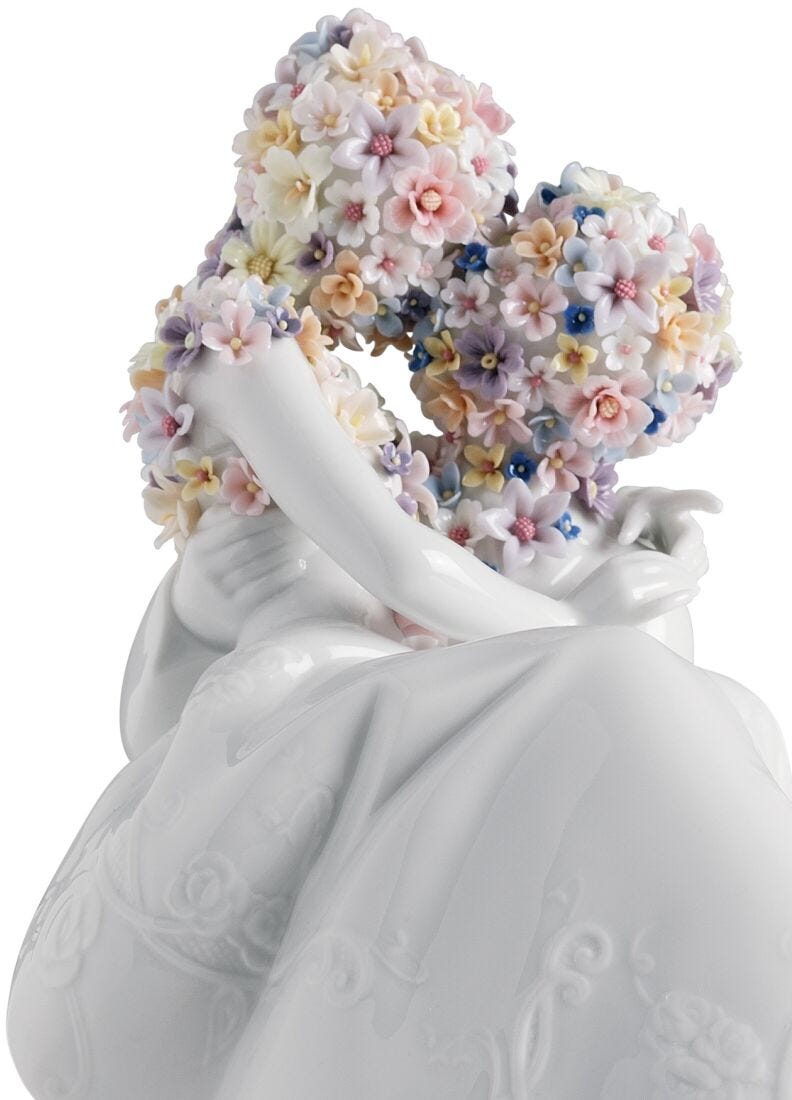Figura joven pareja Amor II con flores en Lladró