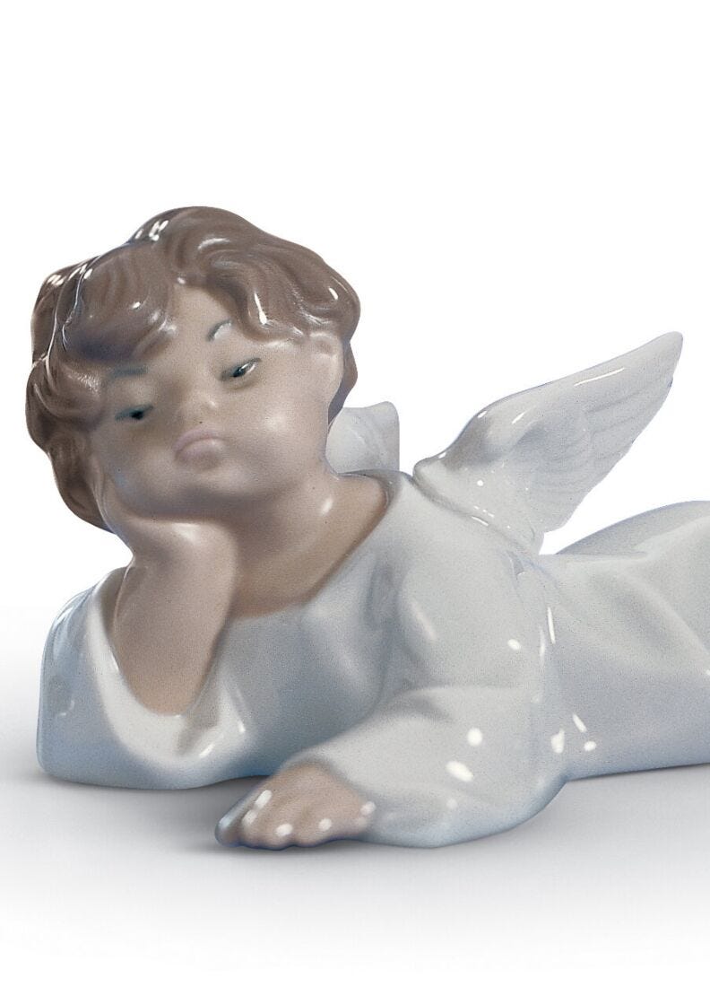 Angel Laying Down Figurine in Lladró