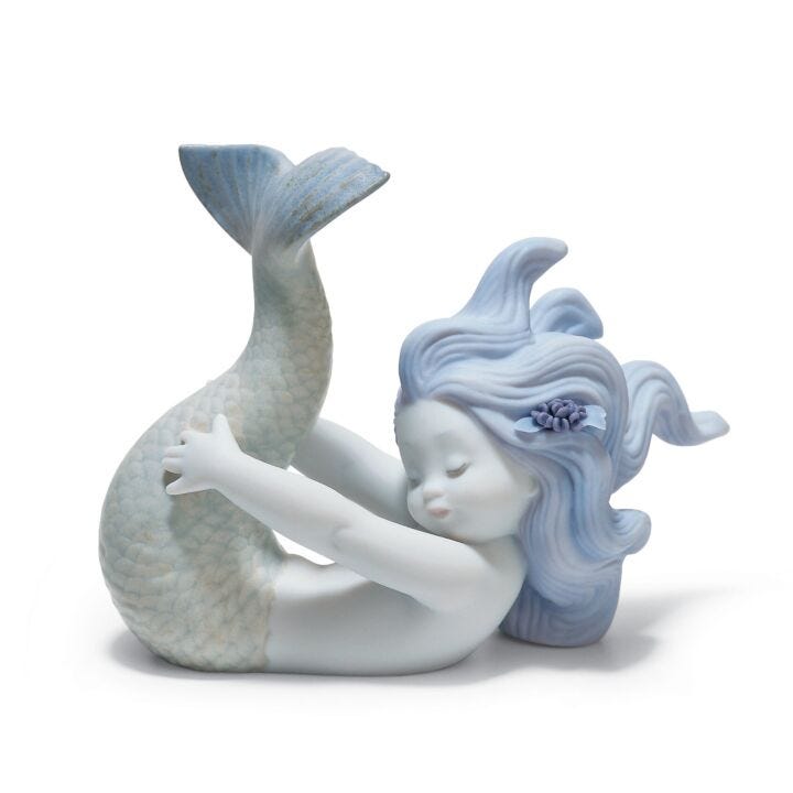 Figurina Sirena Giocando con il mare in Lladró