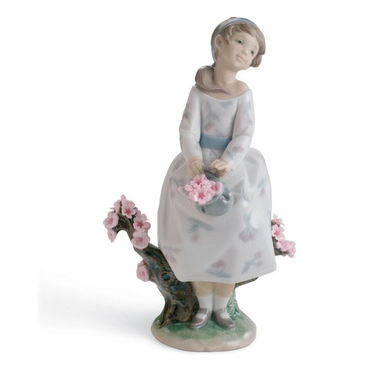 A Walk through Blossoms Girl Figurine in Lladró