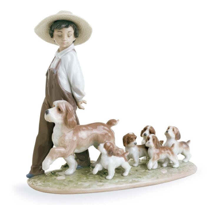 My Little Explorers Boy with Dogs Figurine in Lladró