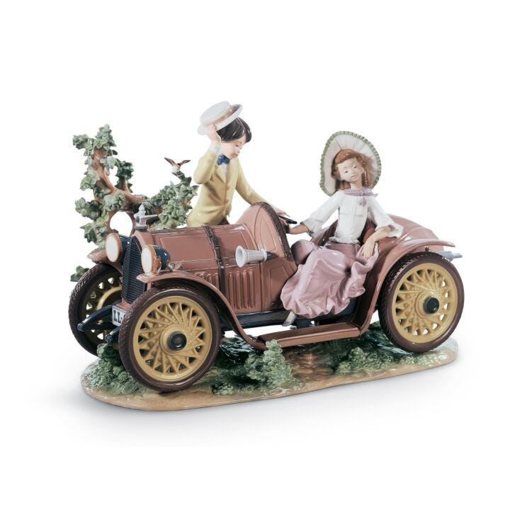 Young Couple with Car Sculpture. Limited Edition in Lladró