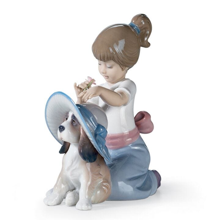 An Elegant Touch Girl Figurine in Lladró