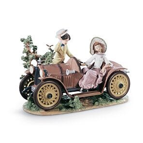 Young Couple with Car Sculpture. Limited Edition