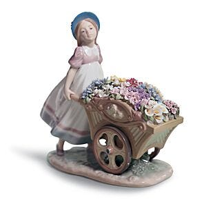 Figurina Bimba Carriola di fiori