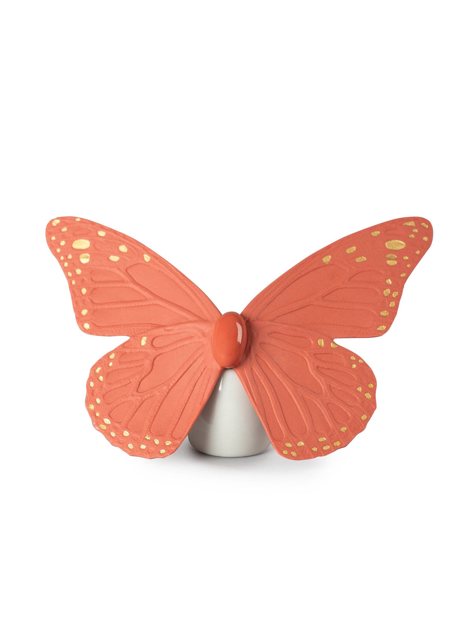Figurina di farfalla. Lucentezza dorata e corallo
