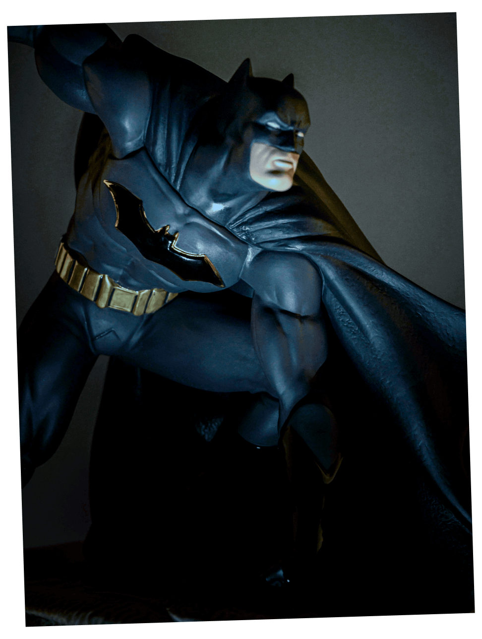 Batman sculpture in his iconic pose