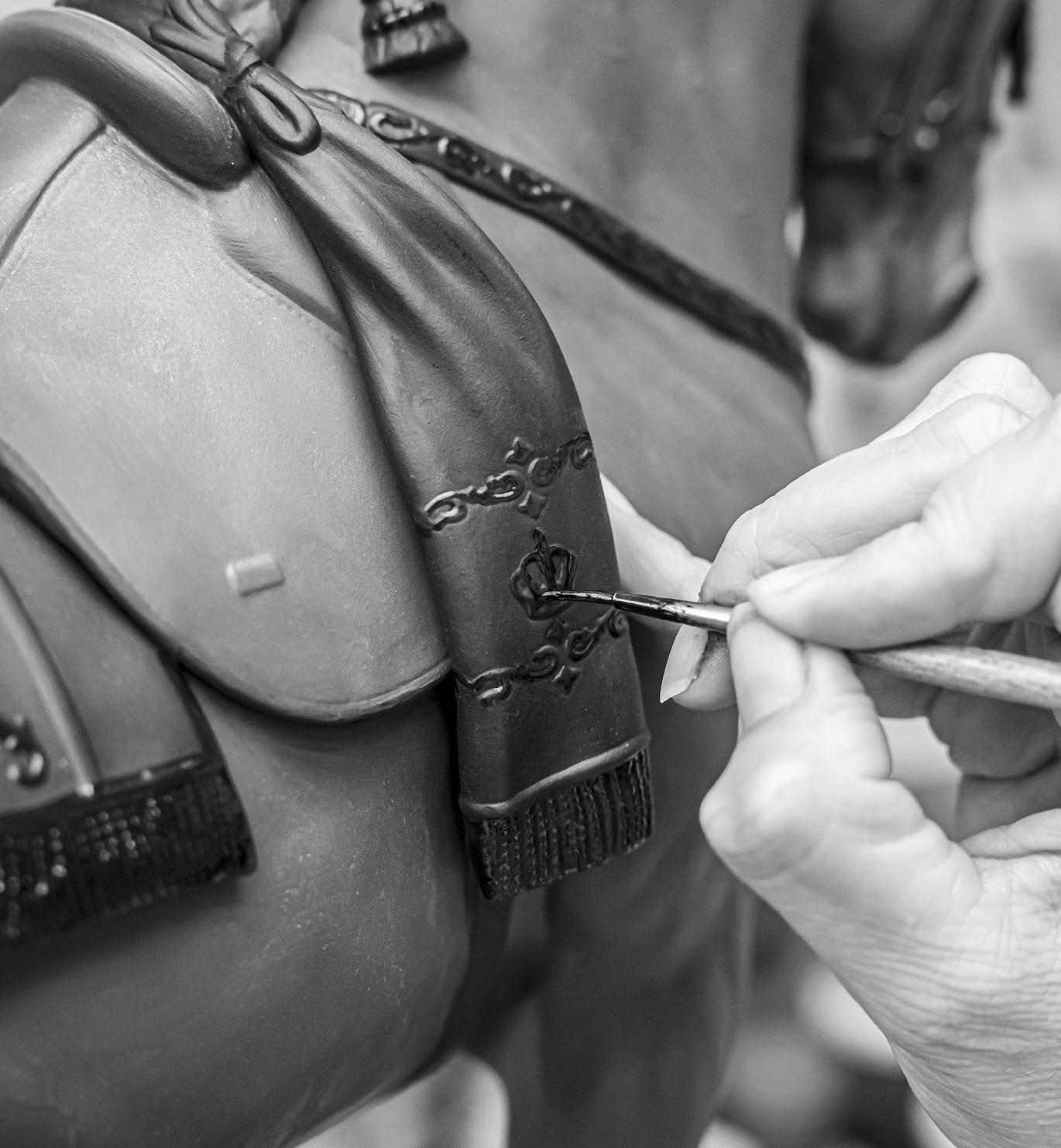 Side profile of Black Spanish Horse with embroidery.