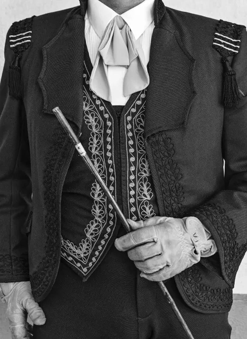 Details of the tamer's attire