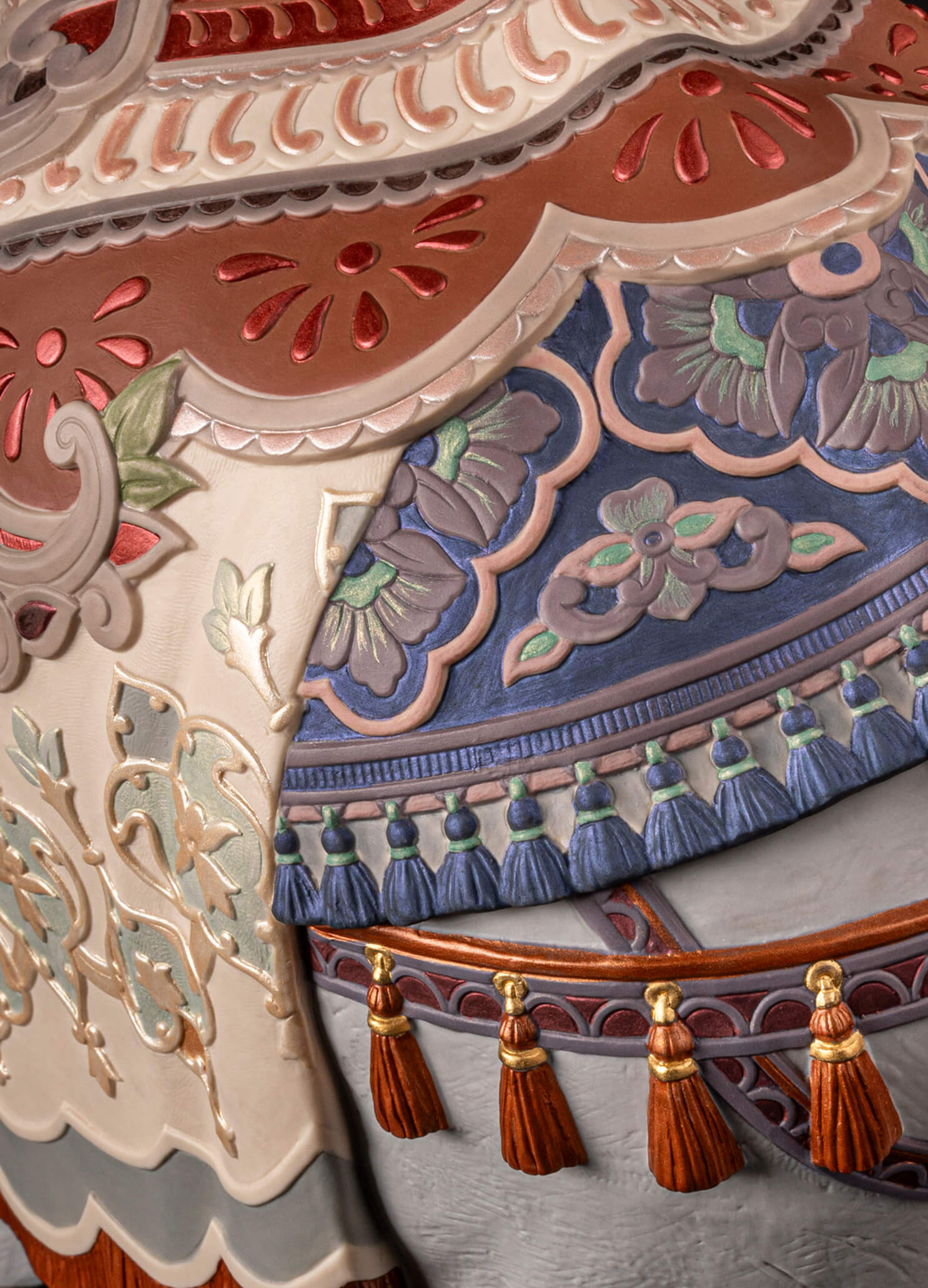 Artisan painting on Lladró Oriens Elephant sculpture