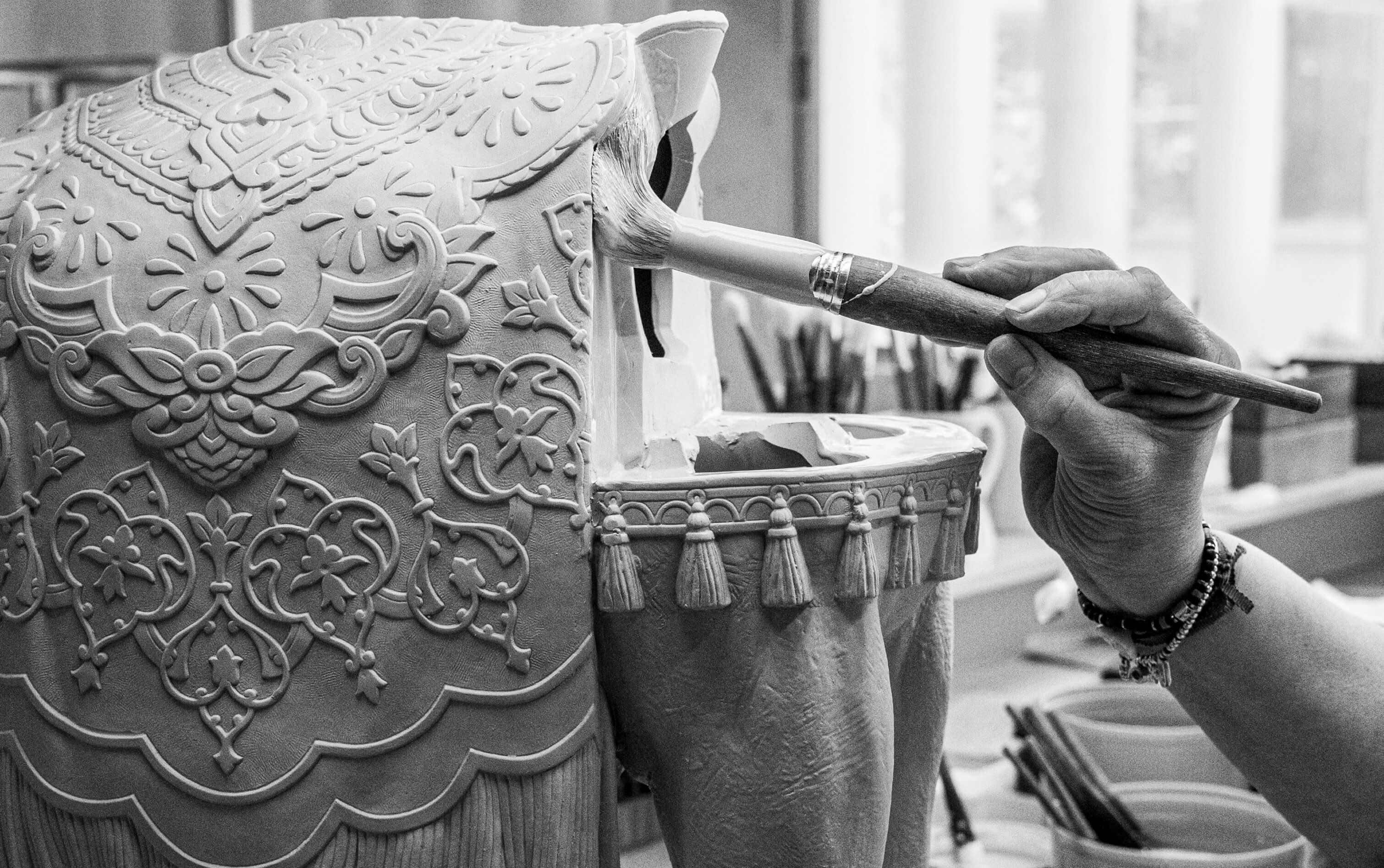Flower-decorated legs of Lladró Oriens Elephant porcelain sculpture