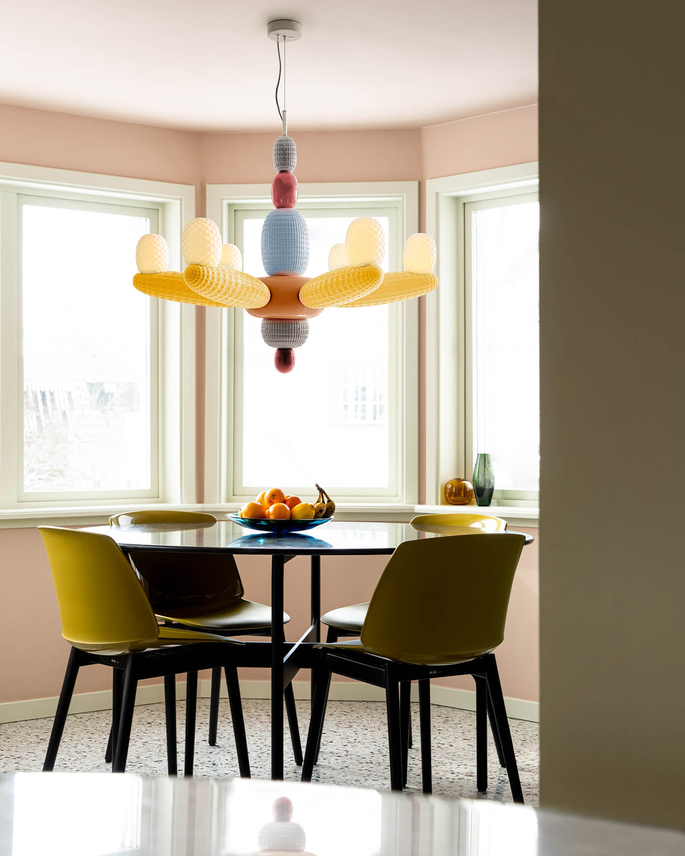 Soft Blown Chandelier over a modern dinning table